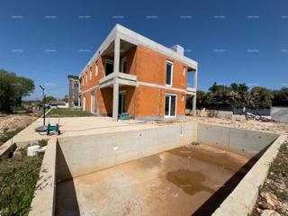 Vendiamo una casa bifamiliare in fase Roh Bau.