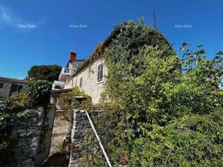 Vendita di una vecchia casa istriana con un grande terreno edificabile, Valbandon