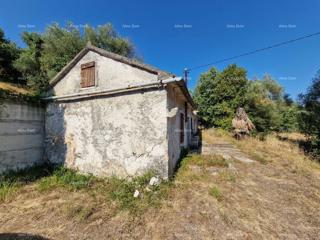 Terreno edificabile con rudere in vendita a Labin, con vista mare e progetto incluso.