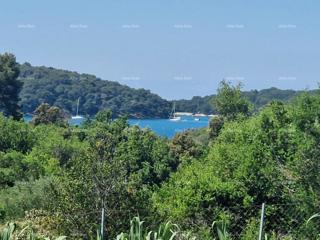 Vinkuran – Terreno attraente con vista mare, a soli 200 m dalla costa