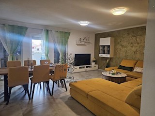 MEDULIN – Appartamento al piano terra con giardino