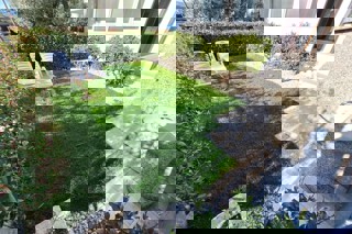 Appartamento con giardino e vista mare