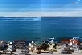 Appartamento con due camere da letto con giardino e vista mare