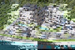 Attico esclusivo con terrazza panoramica in prima fila sul mare