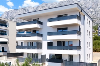Appartamento in un nuovo edificio con giardino e posto auto