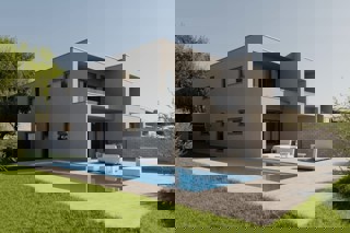 Moderna casa bifamiliare con piscina e vista mare