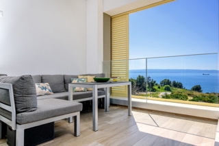 Moderno appartamento con tre camere da letto, garage e parcheggio