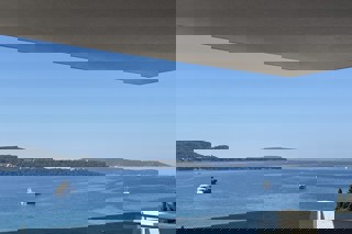 Lussuoso attico con vista mare