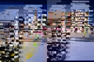 Appartamento con due camere da letto in un nuovo edificio con giardino