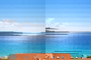 Ampio attico con vista mare aperta