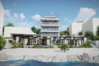 Appartamento di lusso con giardino in prima fila sul mare