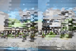 Attico moderno con due camere da letto e terrazza sul tetto in un edificio di nuova costruzione