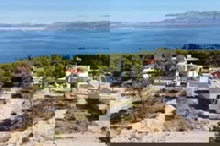 Terreno edificabile con progetto e vista mare