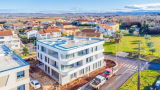 Umago, dintorni! Moderno appartamento con vista mare in costruzione!