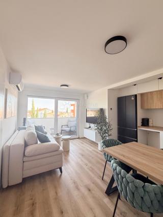 MEDOLINO - Appartamento smart home con terrazza e cortile!