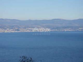 OPATIJA, LOVRAN, LIGANJ - terreno di 1250m2 con vista mare per un edificio residenziale - appartamenti / appartamenti / casa familiare / villa / case in affitto con piscina / casa vacanze con piscina