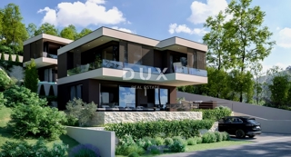 ISTRIA, RABAC - Due lotti di terreno con permessi di costruzione e vista mare