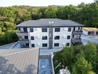 MATULJI, JUŠIĆI, JURDANI- appartamento 1° piano 80,12 m2 in un nuovo edificio DB+2S con giardino