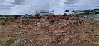 Trogir, Plano, building land 1290 m2, right next to the road, sea view