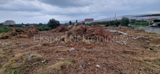 Trogir, Plano, building land 1290 m2, right next to the road, sea view