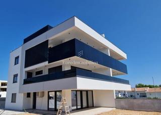 Modern apartment with garden, new building