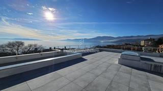 Attico di lusso con terrazza e 3 posti auto