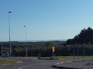 Terreni edificabili e ulivi, con vista sul mare