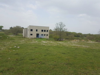 Terreno edificabile con capannone di produzione