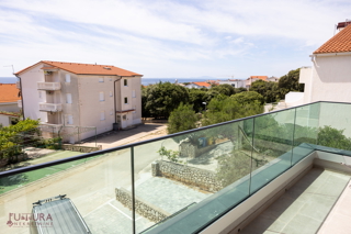 PAG - MANDRE, APPARTAMENTO 100,32 M2, VENDITA, VISTA, GIARDINO, GARAGE, POSIZIONE!!!