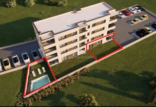 Appartamento con piscina e giardino al piano terra di una nuova palazzina per una piacevole vacanza