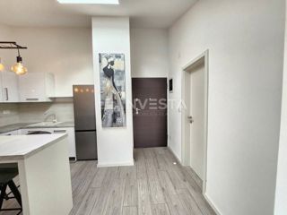 Piccolo appartamento in un edificio di nuova costruzione con terrazza