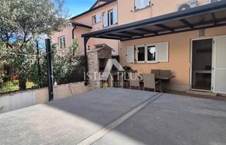Casa a schiera di 103 m2 - con tre camere da letto e un giardino paesaggistico