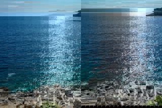 Terreno edificabile a Milna - Prima fila al mare