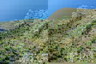Terreno con vista panoramica e casa