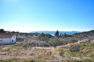 Murter - terreno edificabile con permesso di costruzione per una casa, vista mare