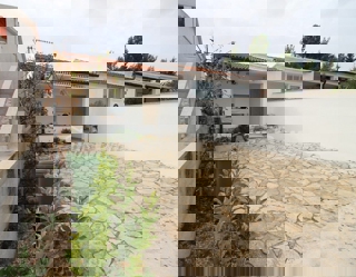 Appartamento a schiera con due camere da letto, vicino al centro