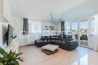 APPARTAMENTO LUSSUOSO A MEDULIN – 95 m² con grande terrazza e parcheggio!