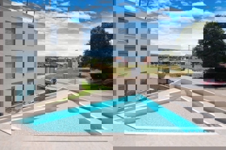 NOVIGRAD - APPARTAMENTO IN NUOVA COSTRUZIONE CON TERRAZZA SUL TETTO E PISCINA IN VENDITA