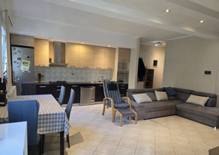 Appartamento di 60 m² con giardino di 50 m² e 2 posti auto: pronto per essere abitato subito!