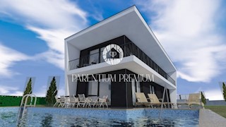 Una villa moderna con piscina e un ampio giardino