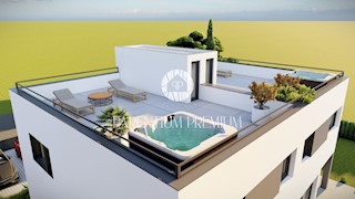 Una nuova villetta bifamiliare con terrazza sul tetto e un'incantevole vista sul mare