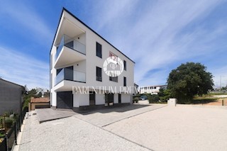 Appartamento in palazzina moderna con cortile, a 400 metri dalla spiaggia