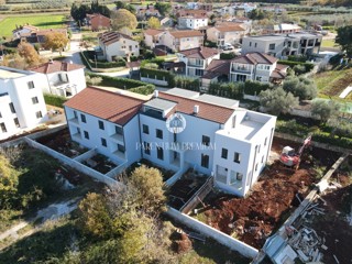 Appartamento su due livelli con due camere da letto e giardino