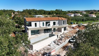 Una bella villa moderna in una posizione tranquilla con vista sul mare
