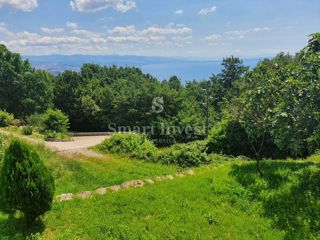 ABBAZIA - BREGI, terreno edificabile con vista mare