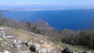 LOVRAN, Terreno edificabile di 994 m2 con una bellissima vista sul mare