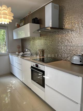 MODERNO BILOCALE CON VISTA MARE