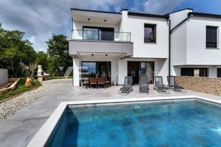 NUOVA CASA BIFAMILIARE CON PISCINA E VISTA MARE