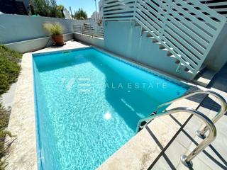 MODERNO TRILOCALE CON PISCINA E VISTA MARE