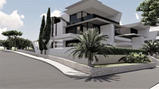 ATTICO IN NUOVO EDIFICIO CON TERRAZZA SUL PIANO TERRA E VISTA MARE APERTA